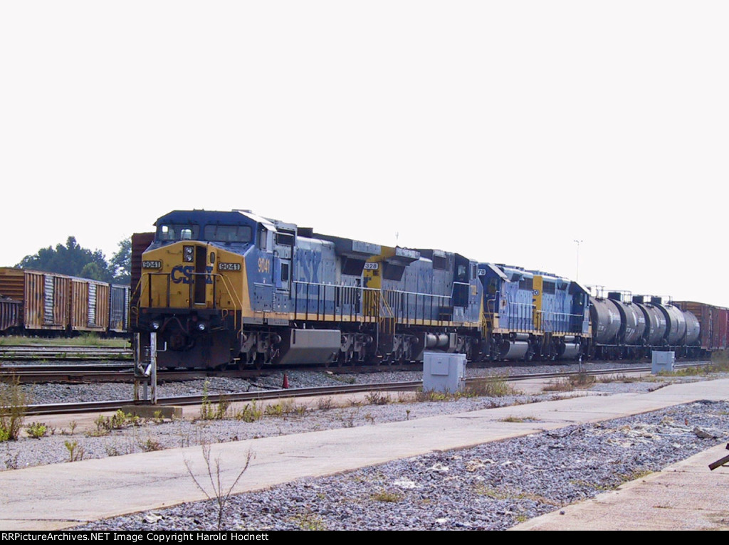 CSX 9041 has brought a train into the yard